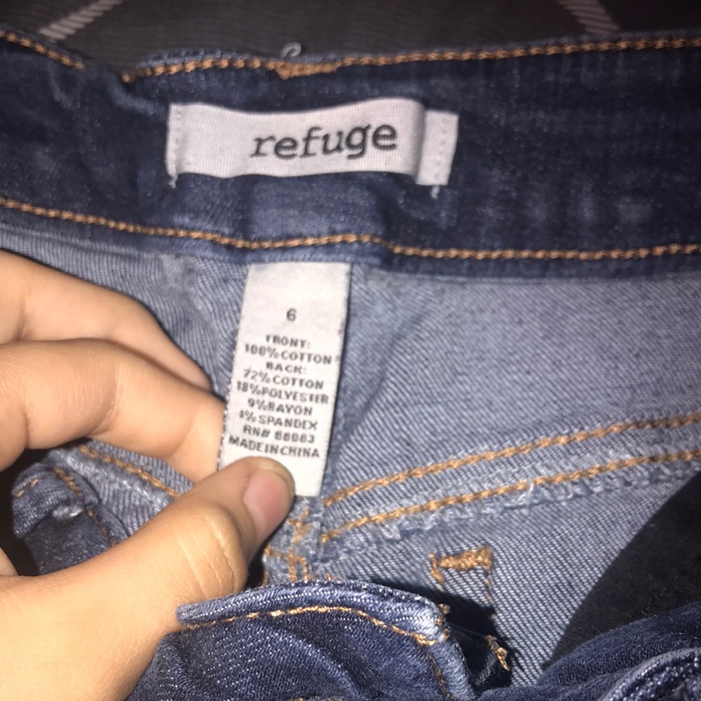 Pair of dark blue Jean ripped pants size 6 in womens